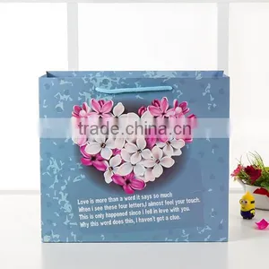 Factory Price Blue Gift Paper Packaging Bag With Handlle for Shopping Wtih Beautiful Flowers thumbnail-1