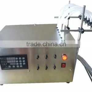 Electric High Accuracy Small Dose 2ml 6 Nozzles Coconut Oil Filling Machine thumbnail-1