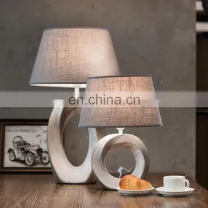 China Wholesale Cheap Hotel Bedside Lamp Custom Vintage White Office Table Lamp Ceramic With Logo thumbnail-1