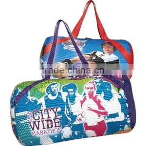 Sublimated Round Duffel Bag With All-Over Print - Made From 600 Denier Heavy Poly Cotton and Measures 12"h x 20"w. thumbnail-1