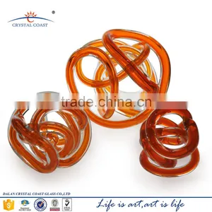 Medium Handcrafted Mid Century Modern Art Decor Cheap Glass Knot Paper Weight thumbnail-1