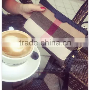 The New Canvas With Leather Clutch Cosmetic Bag thumbnail-1