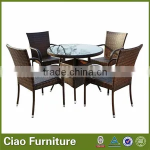The Outdoor Bistro Table and Stackable Rattan Chairs thumbnail-1