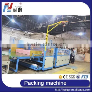 China NaiGu Factory Manufacture Automatic Mattress Film Packaging Machine 51M thumbnail-3