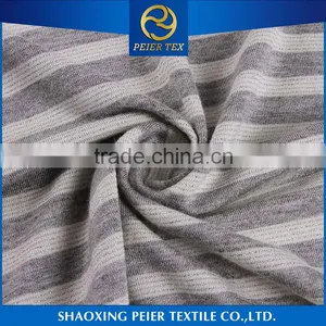 China Manufacturer Anti Static Poly Cation Span Brushed Fabric Tiger Head Fabric Gold Jacquard Fabric thumbnail-1