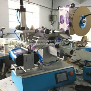 Semi Aumatic Flat Bottle Labeling Machine thumbnail-1