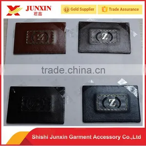 China Cheap Wholesale Custom Jeans Leather Patch Leather Tags for Garment thumbnail-1