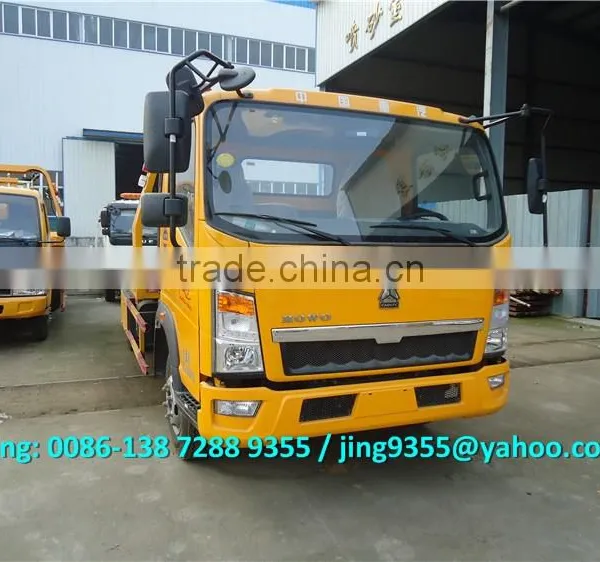 HOWO 3800mm Wheelbase Cheap Wrecker Tow Truck, L5600*W2300 Flatbed Wrecker Towing Truck on Sale in Africa photo-2