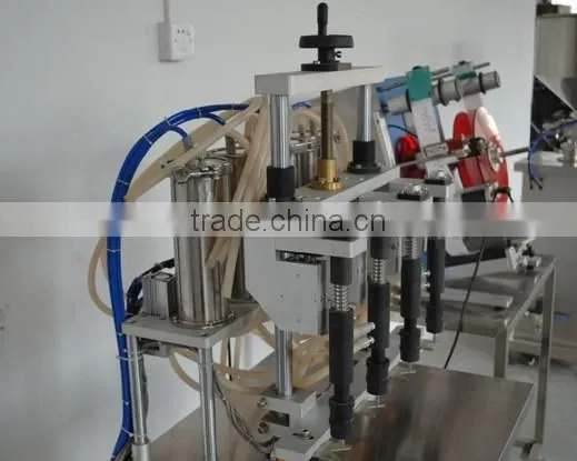 China Guangzhou Factory Small Perfume Bottle Four Head Filling Machine/equipment With Negative Pressure for Sale photo-3