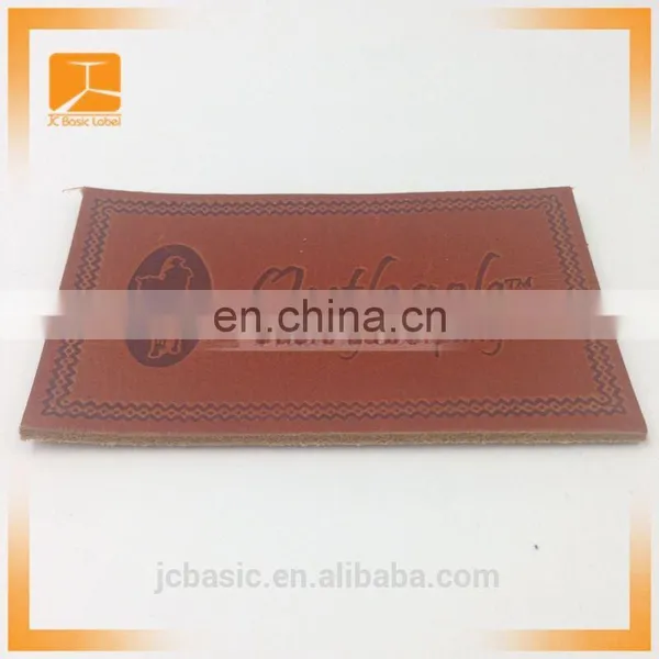 Custom Logo Embossed Genuine Leather Label for Clothing photo-2