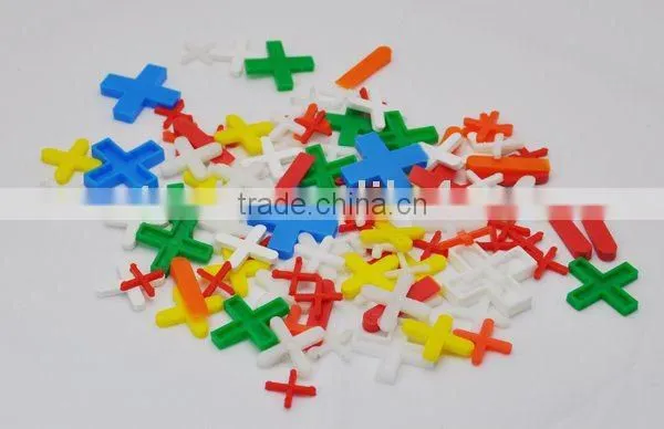 tile spacer, tile wedge, tile crosser, tiling tool, tile tool