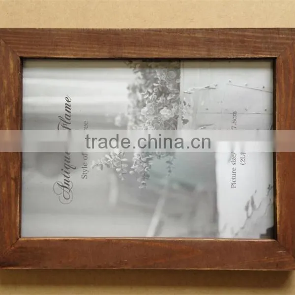 Vintage baked color wooden photo frame with roaster color
