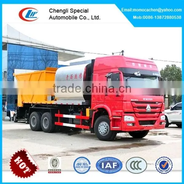 Howo 6x4 Asphalt Gravel Chip Sealer,asphalt Synchronous Chip Sealer 8000L Bitumen and 120000L Stone photo-2