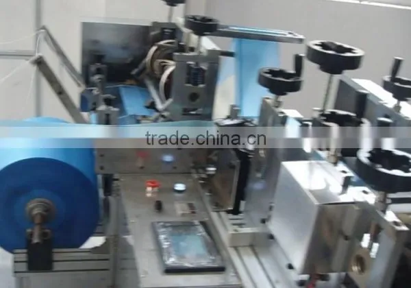 Plastic Shoe Cover Making Machinery photo-4