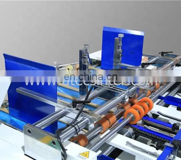 UTM1100B Servo Motor Driven Fast Speed Double Lane Line Automatic Carton Box Window Patching Machine photo-4