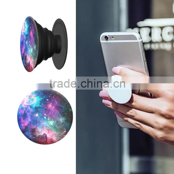 Expanding Stand and Grip for Smartphones and Tablets Air Event Holder