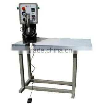 Attaching Machine