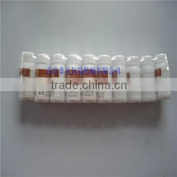 Servo Motor Control Automatic Bottles Shrink Wrapping Machine photo-6