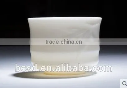 Hot white ceramic mug with tea mug