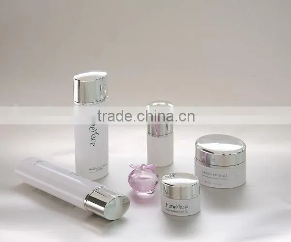 Glass Bottle and Cream Jar