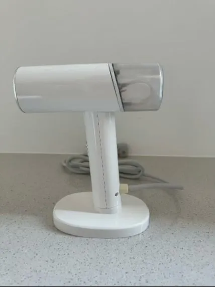 Compact and Space-Saving Handheld Garment Steamer for Small Areas