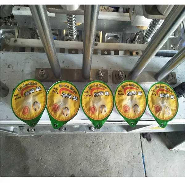 Automatic Fruit Pulp Juice Pudding Cup Filling Machine Jelly Plastic Cup Filling Sealing Machine photo-4