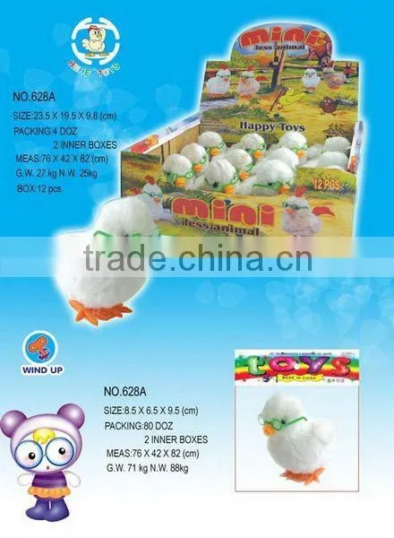 SMALL WIND UP HEN WITH GLASSES