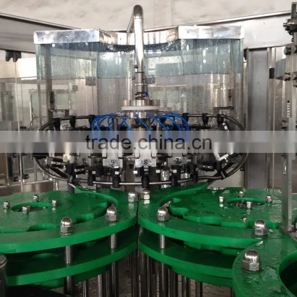 Машина для наполнения стеклянных бутылок газированными безалкогольными напитками photo-2