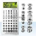 Display of 60 pieces of assorted size steel flesh tunnels