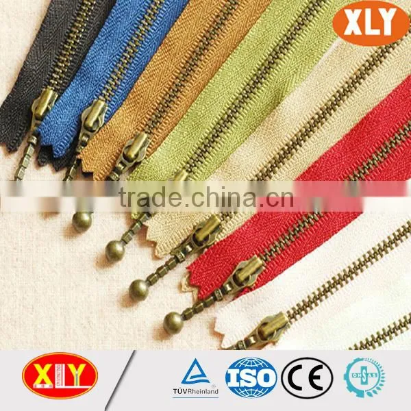 Shenzhen China xly zipper factory developing new product antique brass metal zipper