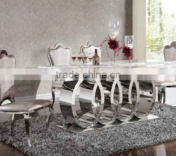 Modern Luxury Polishing Stainless Steel Dining Table and Chairs Set With Marble Top Furniture photo-3