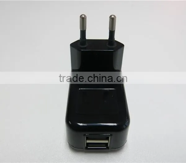 International Universal Travel Adapter 5V 2A Dual USB Power Adapter photo-3
