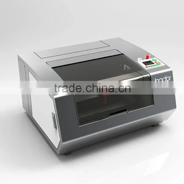 China Cnc Mini Laser Stamp Making Machine photo-2