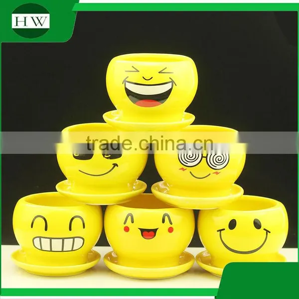Wholesale Cheap Mini Yellow Round Cup Shape Handwork Decoration Smiling Face Cement Garden Flower Pot photo-2