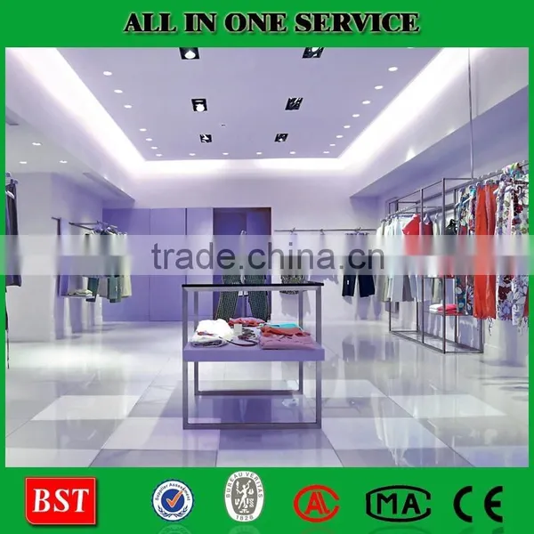 First Rate Ladies Clothes Shop With Metal and Wood Display Racks photo-6