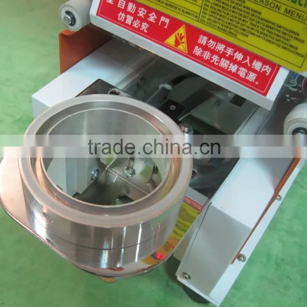 Plastic Packaging Material and Electric Driven Type Puffed Food Auto Filling And Sealing Machine, Small Cup Sealing Machine photo-4