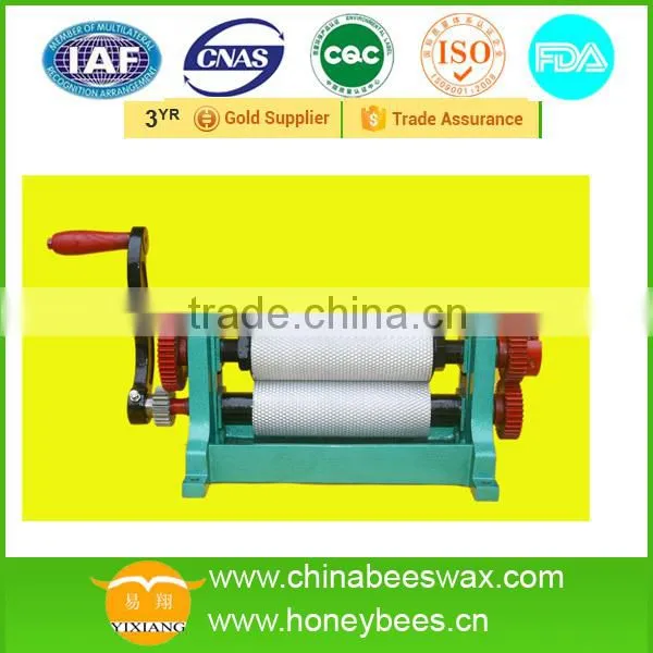 High Quality Beeswax Comb Foundation Machine photo-3