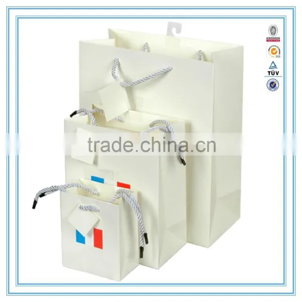 China Custom White Luxury Paper Bag & Brand Paper Bag Printing Logo With Handles photo-5
