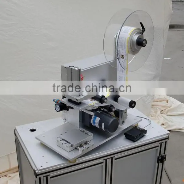 Semi Automatic Bottle Filling Capping And Labeling Machine photo-2