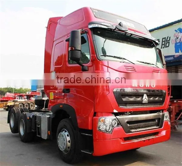 SINOTRUK HOWO T7H 6X2 440HP Euro4 MAN Engine Tractor Head Truck With Rear Axle Lifting photo-2