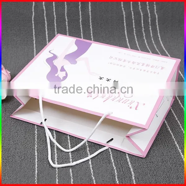 Luxury Custom High Quality Clothes Packing Paper Bag photo-2