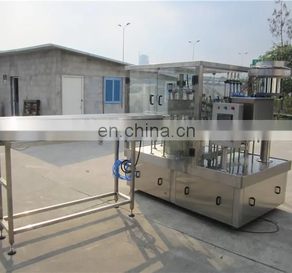 Filling Capping Screwing Packaging Machine for Packing Plastic Drinking Water Pouch With Spout Mouth and Cap photo-4