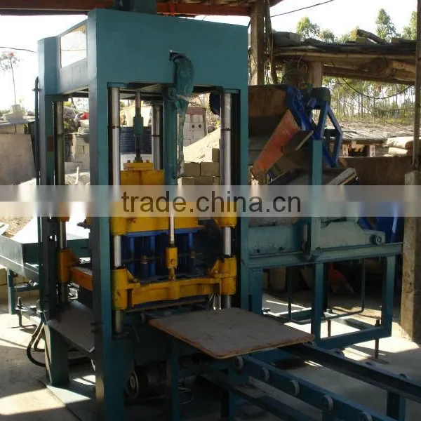 Manual concrete block machine making