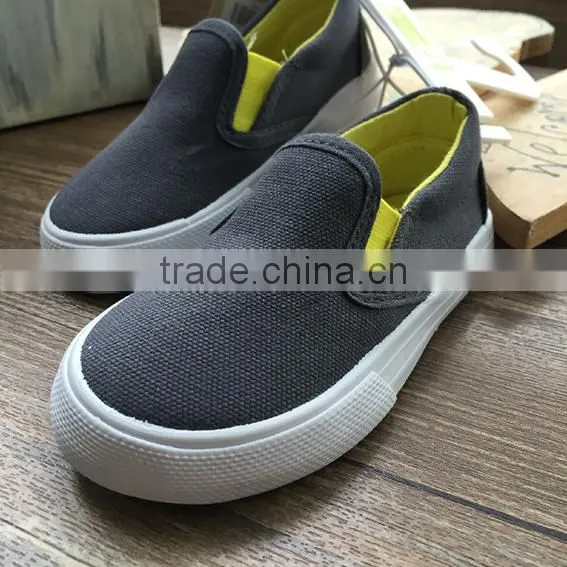 Grey Color Little Kids Casual Shoes Export Surplus Boys Canvas Slip-on Shoe Excess Stock photo-2