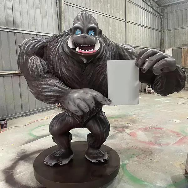 Customize a 2-meter-tall Cartoon Gorilla Sculpture. The Advertising Function is Made of Fiberglass and is Suitable for Commercial Display.