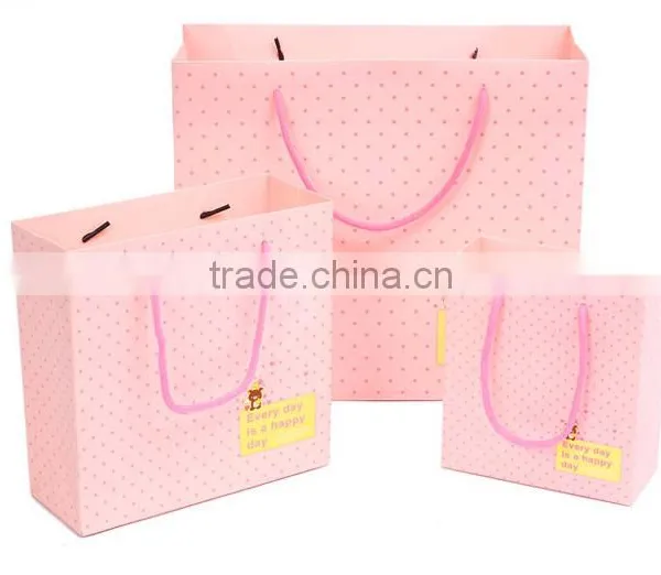 Fancy Folded Die Cut Handle Offset Printing Kraft Paper Bag photo-4