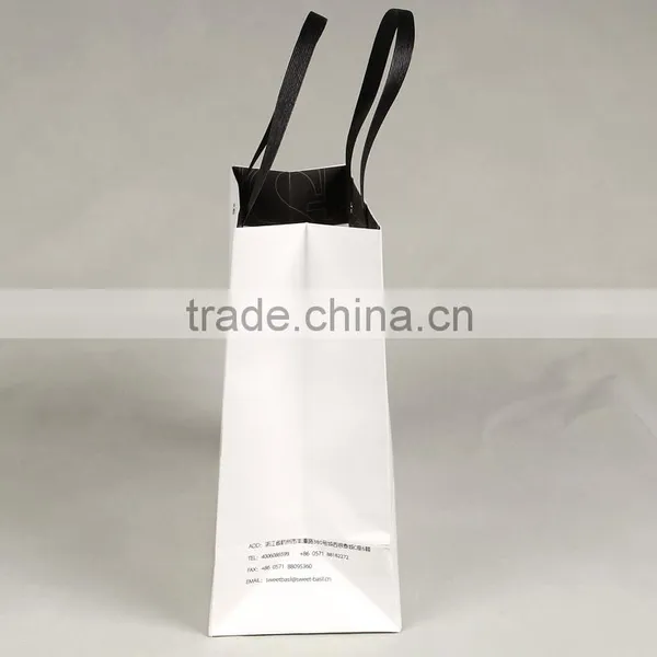 Recyclable Medium Hand Length Handle Specialty Paper Bag for Shopping Packaging photo-3
