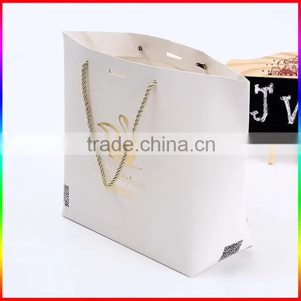 High Quality Glossy White Paper Gift Bags With Gold Foil Logo photo-2