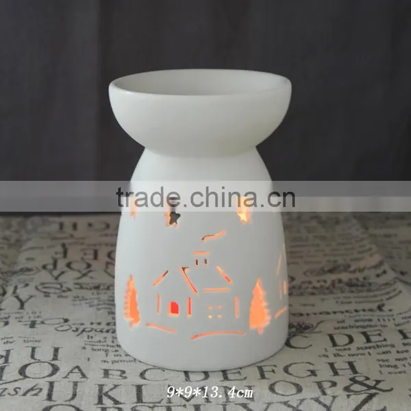 Hot sale porcelain white Christmas T-light oil burner with hollow design