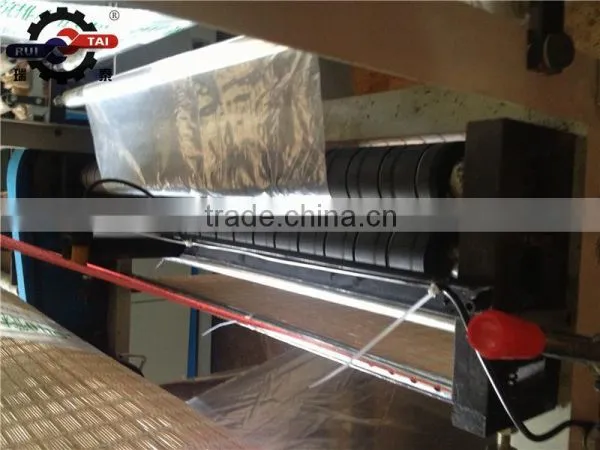Automatic Two Layer Four Lines Bag Making Machine photo-4